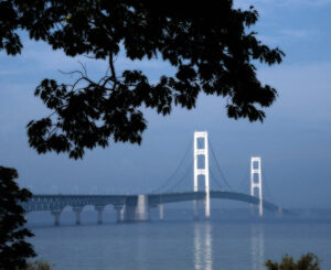 The Mackinac Bridge enveloped in a soft morning haze, captured by Ken Osborne