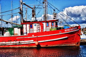 Colorful fishing boat "Silver Harvester" in Alaskan harbor by Ken Osborne.