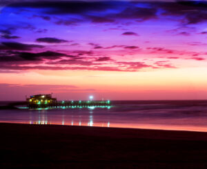 The Galveston Fishing Pier under a twilight sky in a Ken Osborne photograph