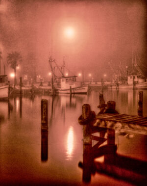 Shrimpboats under a foggy glow in Rockport harbor