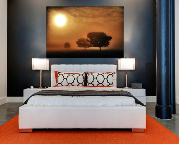 "Dawn's Serenity" photograph by Ken Osborne featured above a bed in a stylish bedroom setting