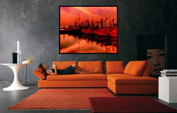 "Harbor Hues" photograph by Ken Osborne enhances the contemporary decor with its warm sunset colors